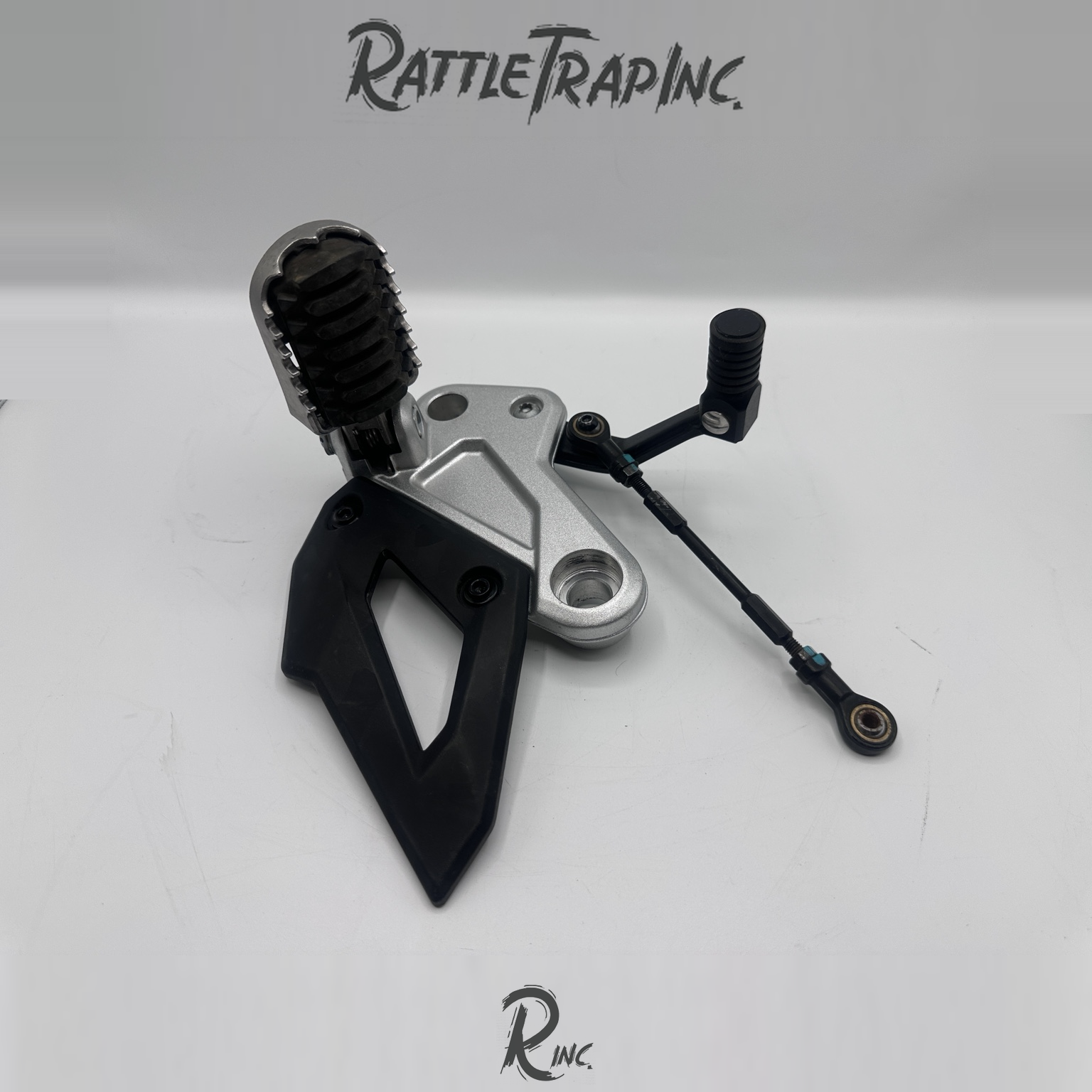 2025 CFMOTO Ibex 450 OEM Left Rider Footpeg Bracket & Shifter Assembly (Used, Stock No: 0998-B04)
